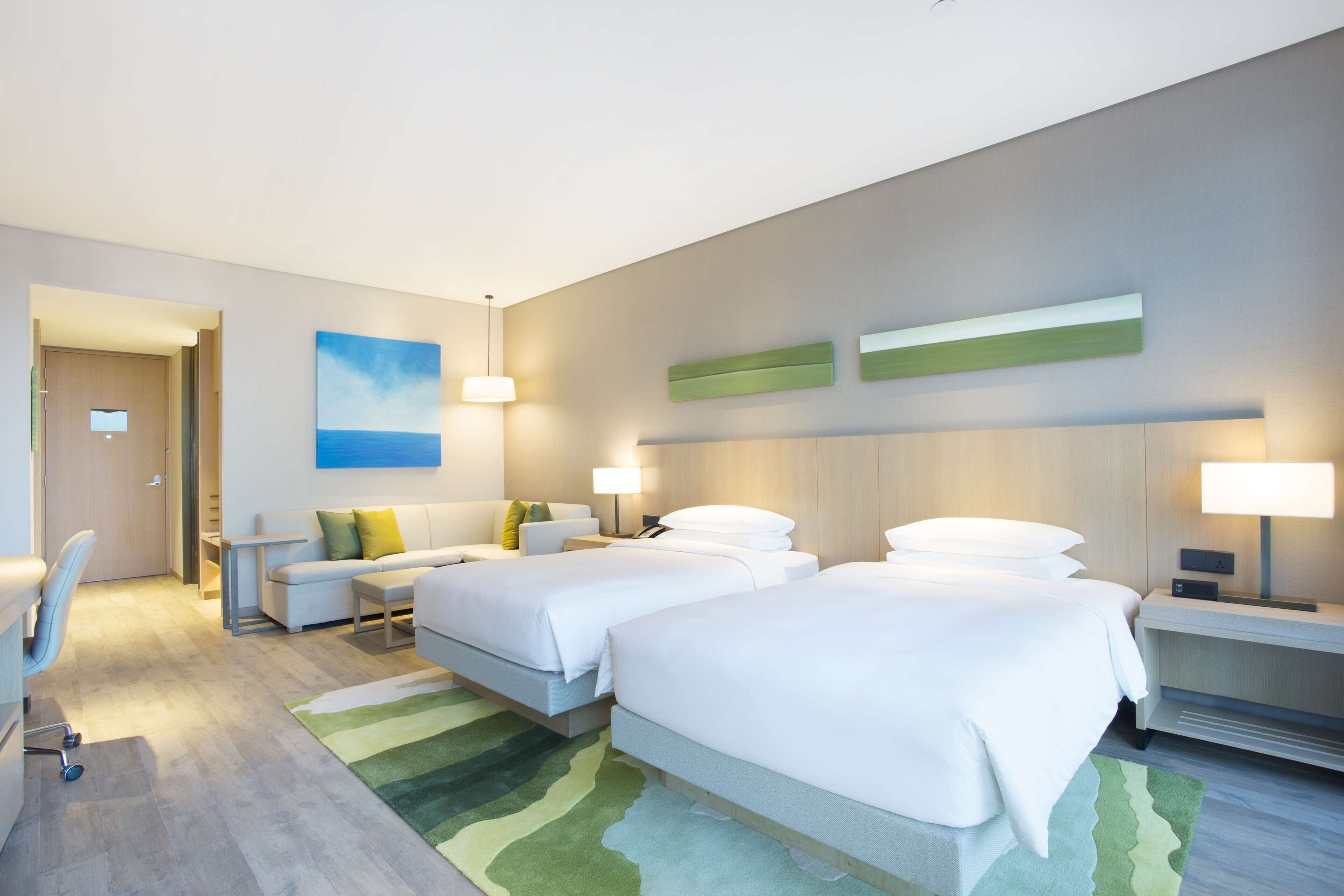 ocean view two twin beds | premium bedding, down duvets, in-room safe, desk