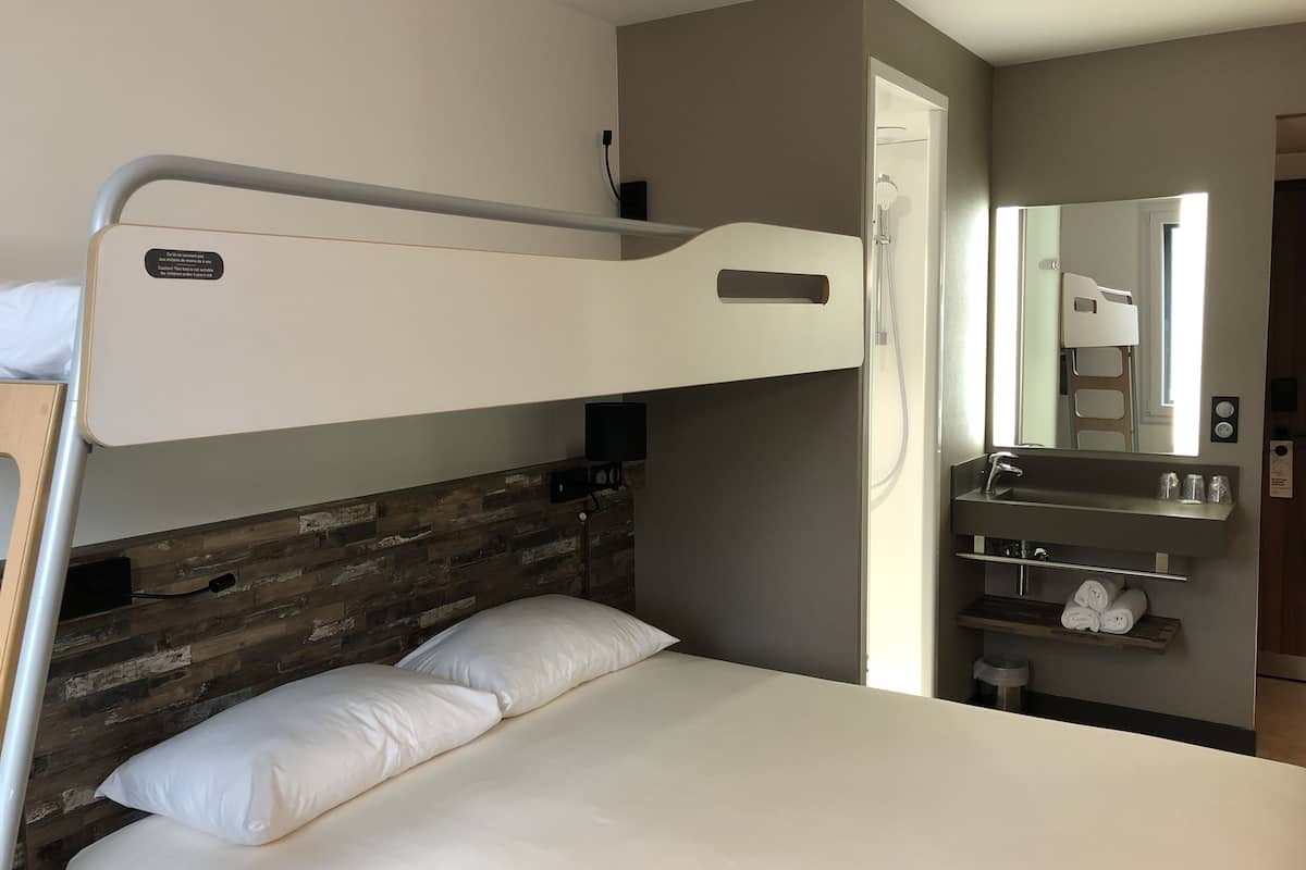 triple room, multiple beds | bathroom | shower, eco-friendly toiletries, hair dryer, towels