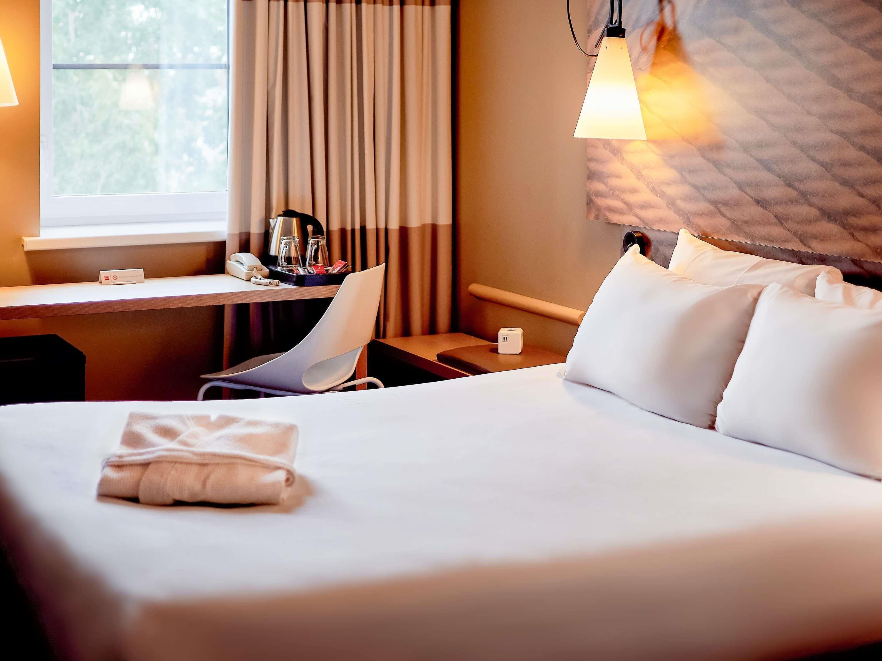 Premium bedding, pillow-top beds, desk, laptop workspace