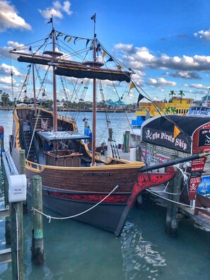 Experience the classic charm of the Royal Conquest, a historic sailing ship moored at the marina.