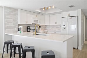 Fridge, microwave, oven, stovetop - Corner Beach Front Unit - Beach Place #412 (Madeira Beach)