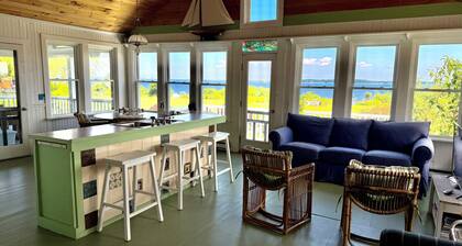 Classic waterfront cottage on Prudence Island, private beach, dock & mooring