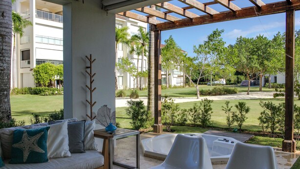 Superior Triple Room, 3 Bedrooms, Kitchen | Living area | 42-inch LCD TV with cable channels, TV - Dominican Dreams (Punta Cana)
