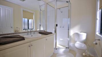Bathtub, hair dryer, towels, soap