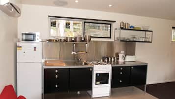 Full-sized fridge, microwave, stovetop, electric kettle