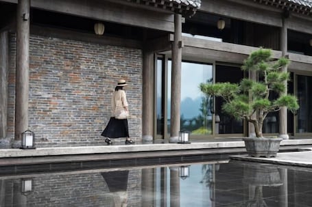 Escrivaninha, cortinas blackout, Wi-Fi de cortesia. Tai Chi Hotel