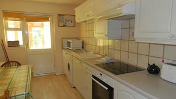 Bungalow, 2 Bedrooms | Private kitchen | Full-size fridge, microwave, oven, stovetop