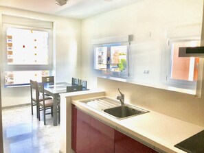 Fridge, microwave, oven, coffee/tea maker