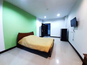 Standard Double Room | Blackout drapes, rollaway beds, free WiFi - Thanarom Place (Phan Thong)