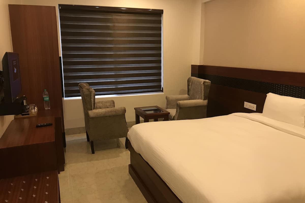 Luxe beddengoed, donzen dekbedden, een kluis op de kamer
