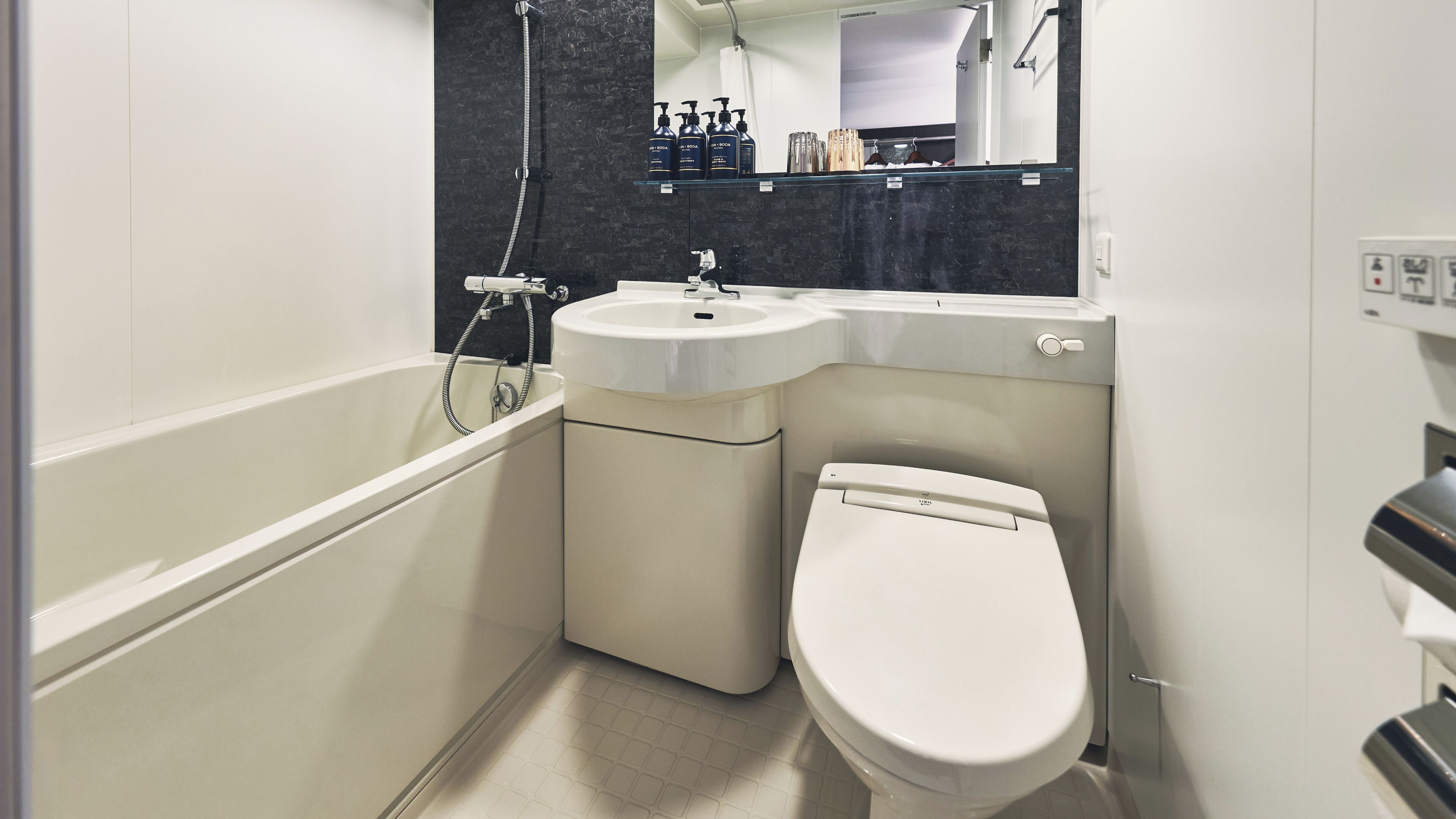 combined shower/bathtub, hair dryer, bathrobes, slippers