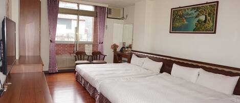 Deluxe Quadruple Room | Blackout drapes, soundproofing, free WiFi, bed sheets