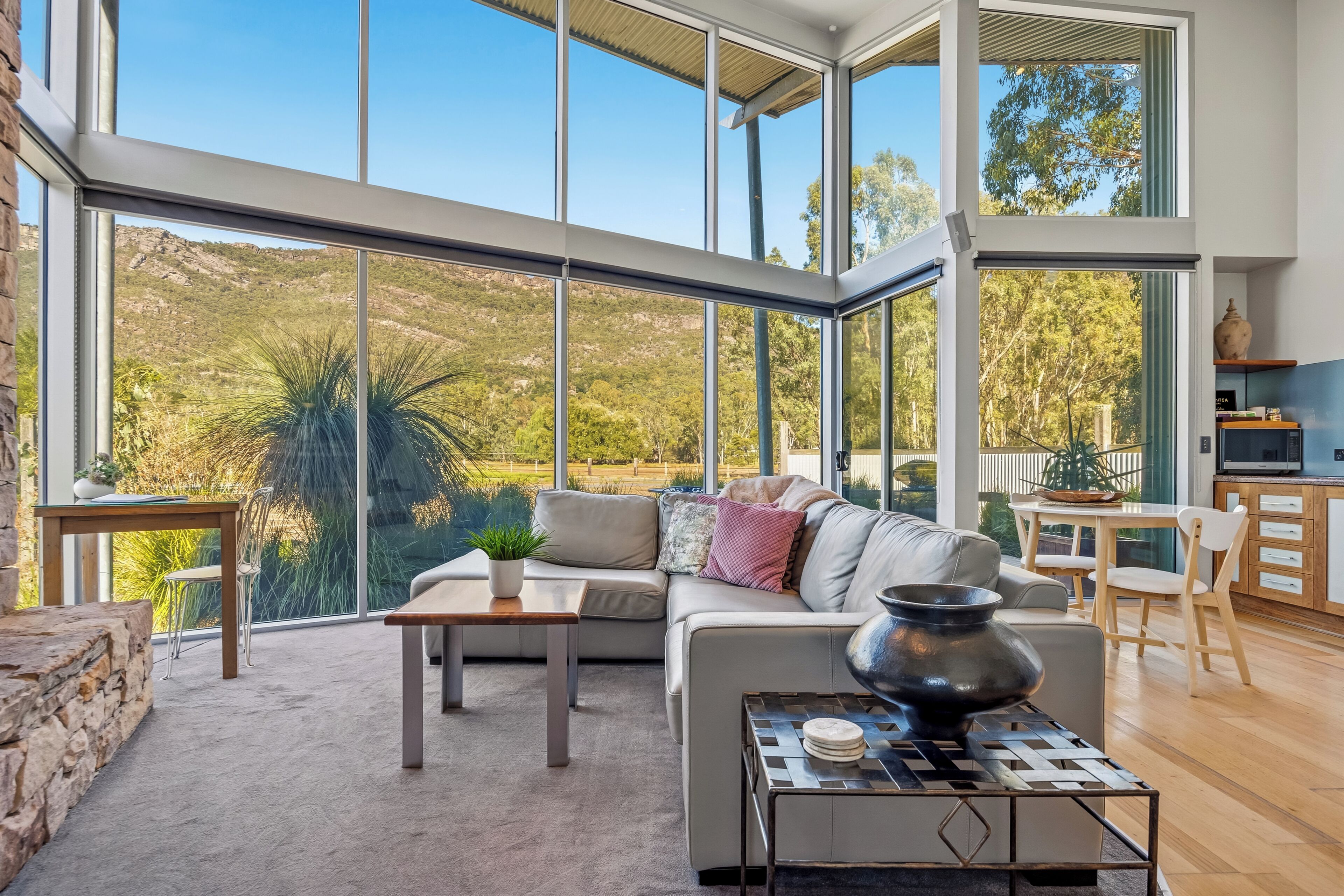 Luxury Chalet (Bushland Luxury Couples Retreat) | Living area | Flat-screen TV, fireplace, DVD player