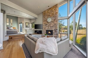 Luxury Chalet (Bushland Luxury Couples Retreat) | Living area | Flat-screen TV, fireplace, DVD player - Bushland (Halls Gap)