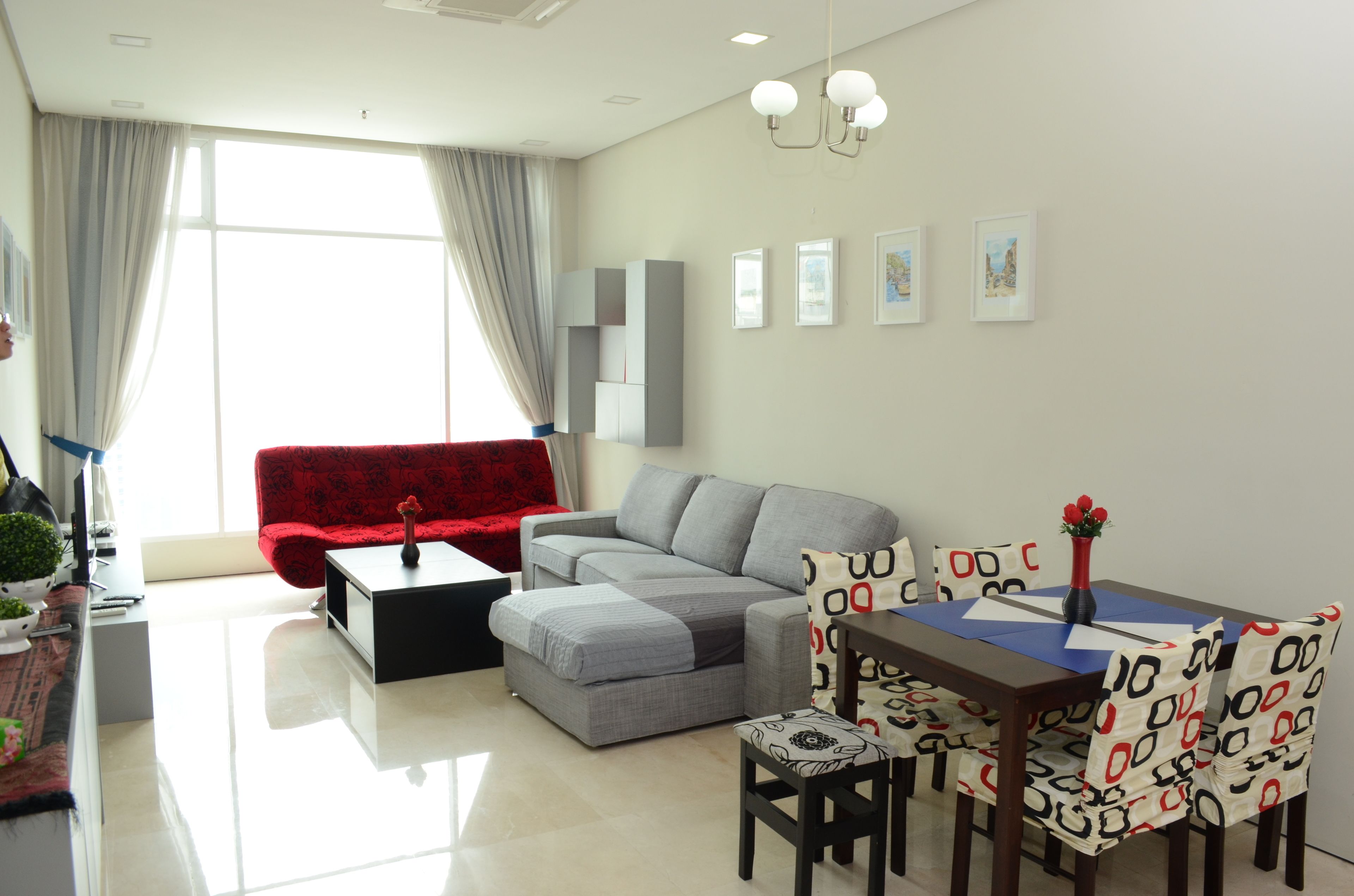 exclusive apartment, 2 bedrooms, 1 bathroom | living area | 40-inch flat-screen tv with cable channels, tv