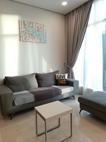 40-inch flat-screen TV with cable channels, TV