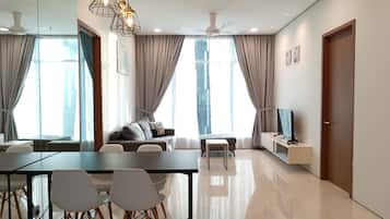 Exclusive Apartment, 3 Bedrooms | Living area | 40-inch flat-screen TV with cable channels, TV