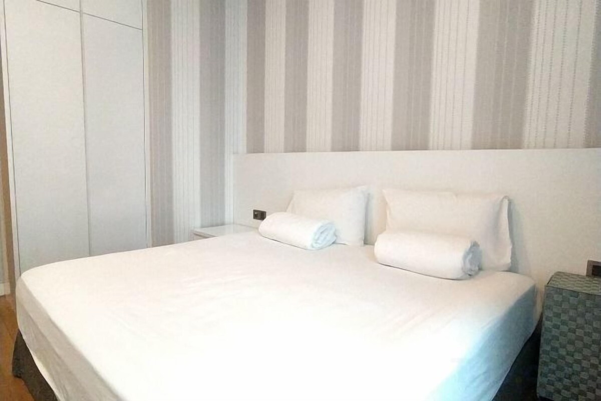 2 bedrooms, desk, blackout drapes, iron/ironing board
