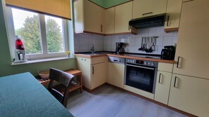 Fridge, oven, dishwasher, highchair
