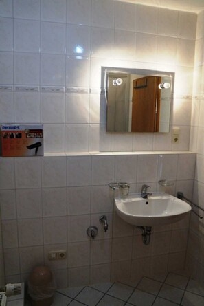 Regadera y secadora de cabello 