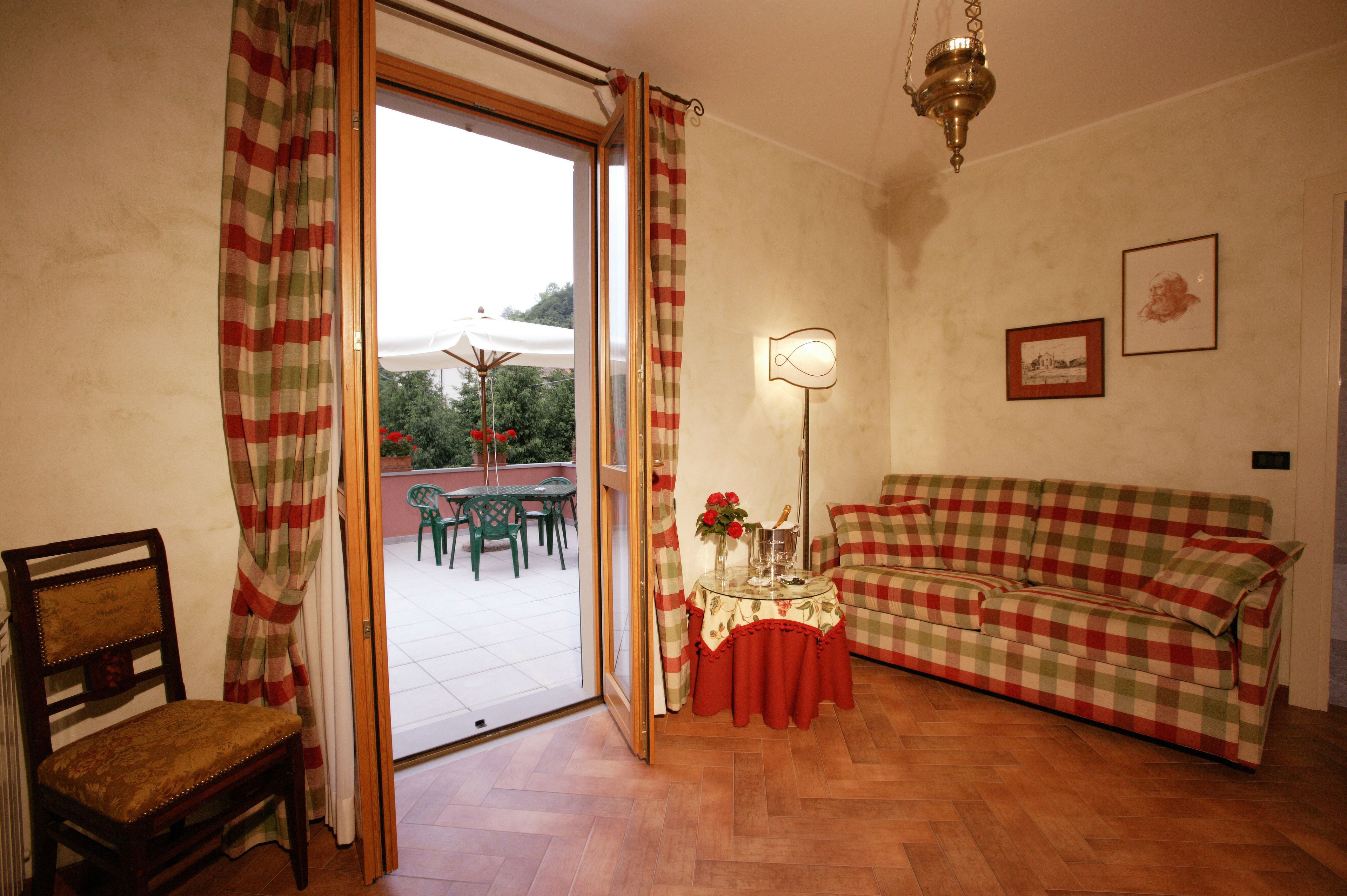 Junior Studio Suite, Terrace | Minibar, in-room safe, desk, blackout curtains