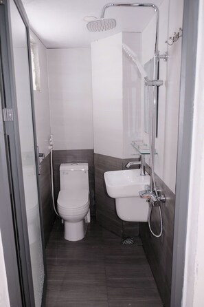 Shower, hair dryer, bathrobes, slippers