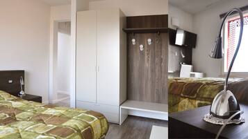 Family Room, Multiple Beds | Down comforters, desk, laptop workspace, blackout drapes