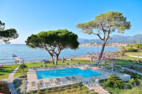 Outdoor pool, open 9:00 AM to 8:00 PM, sun loungers