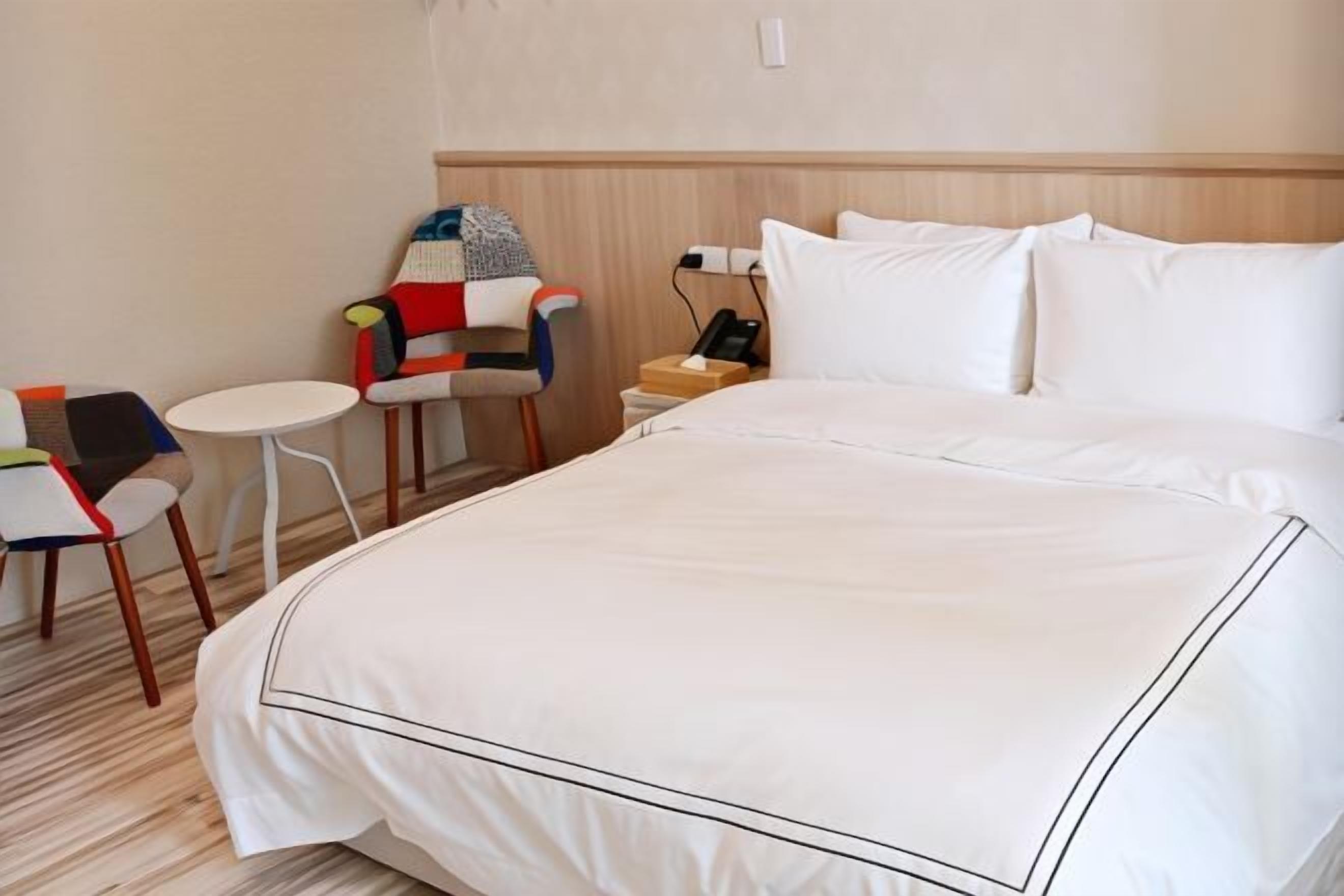 Premium bedding, blackout curtains, cots/infant beds, free WiFi