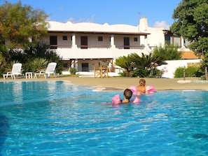 Outdoor pool, pool umbrellas, pool loungers