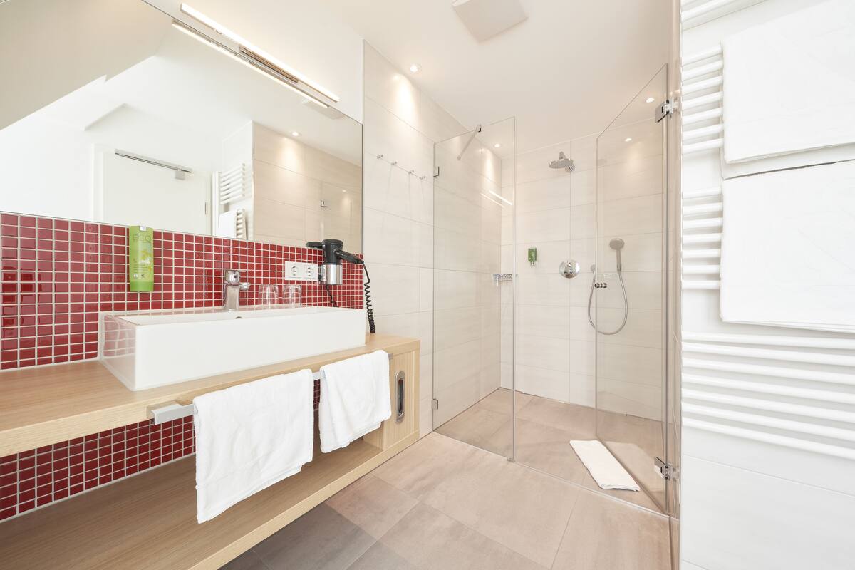 family room | bathroom | shower, free toiletries, hair dryer, towels