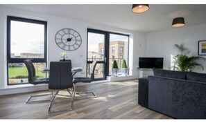 Premium Apartment, 2 Bedrooms | Living room | Flat-screen TV, Netflix
