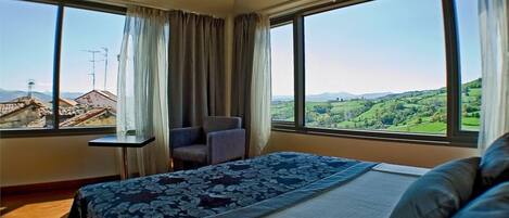 Minibar, desk, blackout drapes, iron/ironing board