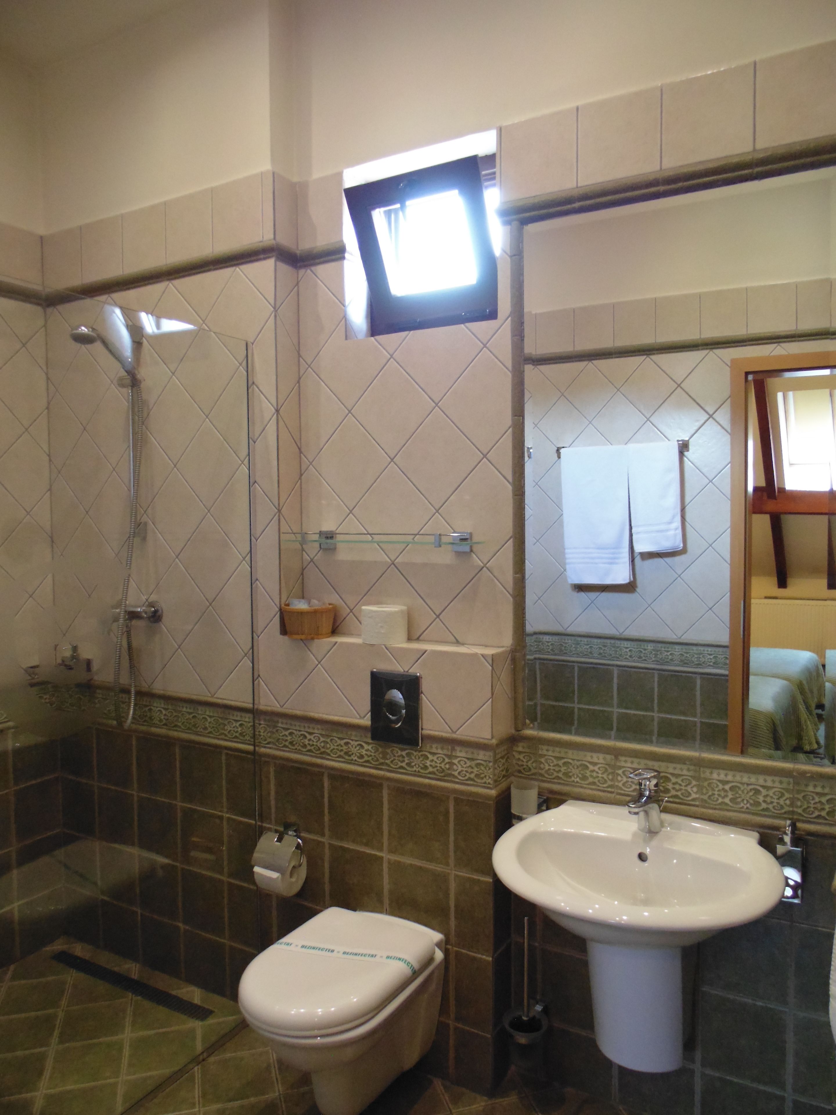 quadruple room | bathroom | shower, free toiletries, hair dryer, bathrobes