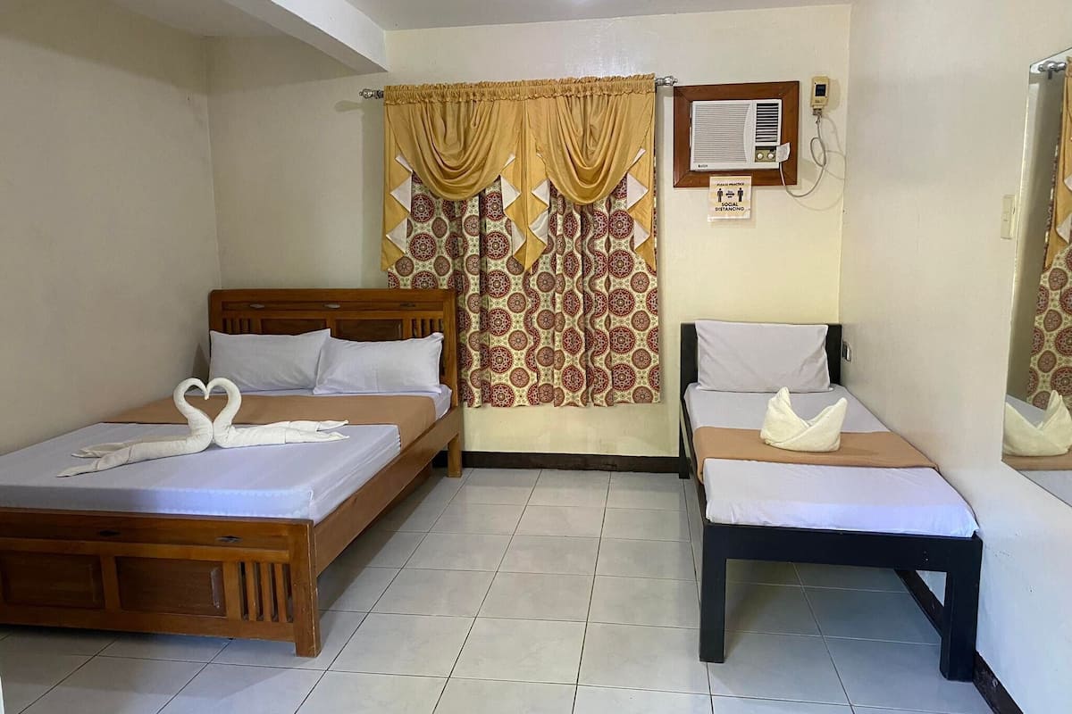 economy room | desk, iron/ironing board