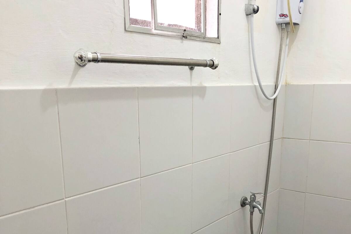 shower, free toiletries, slippers, towels