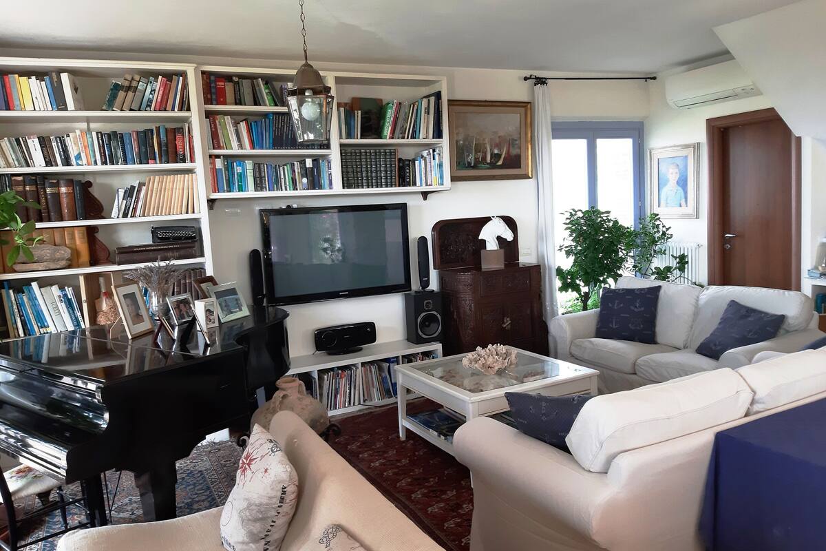 Design Villa | Living area | 32-inch flat-screen TV with digital channels, TV, fireplace