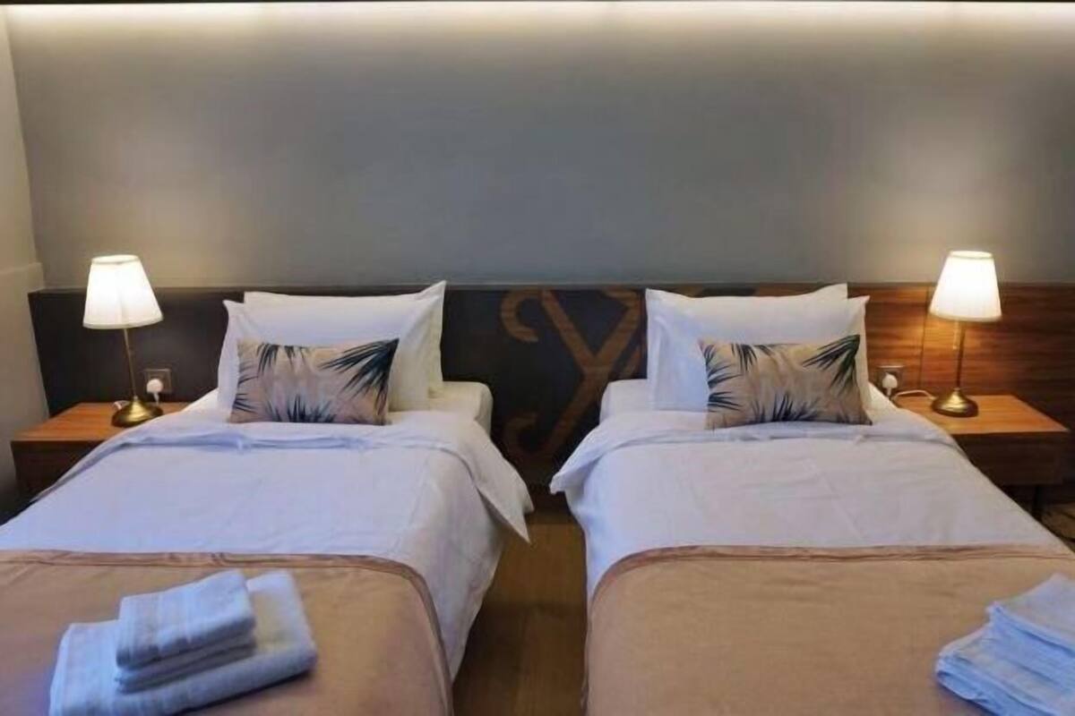 Premium bedding, desk, iron/ironing board (on request), WiFi (free)