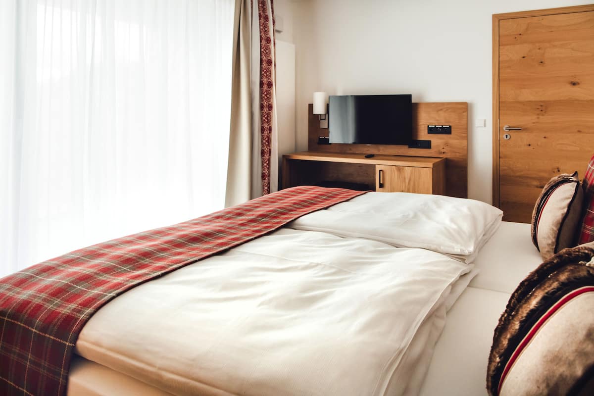 Suite | 1 slaapkamer, luxe beddengoed, een minibar, een kluis op de kamer