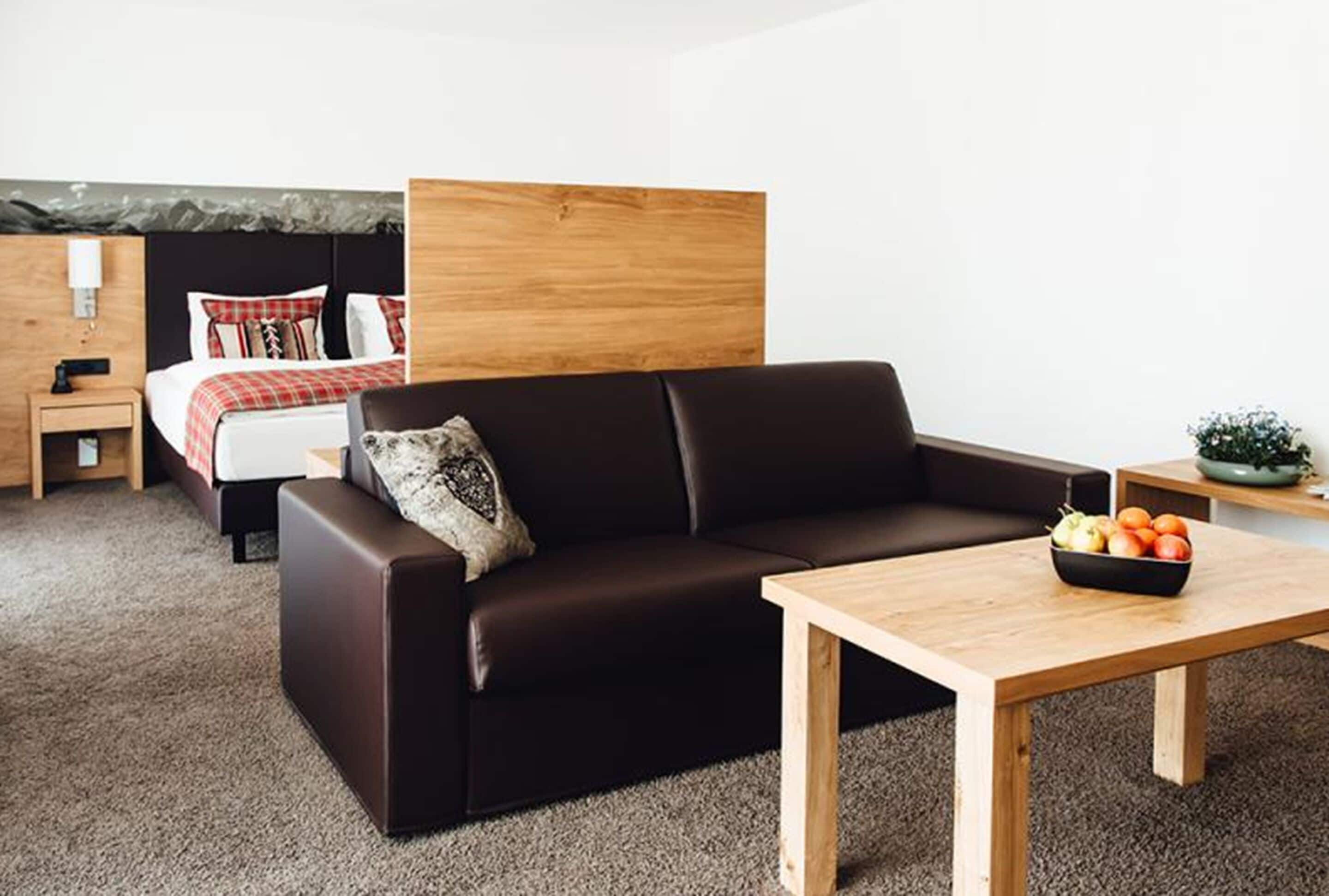 junior suite | living area | 40-inch flat-screen tv with cable channels, tv, toys