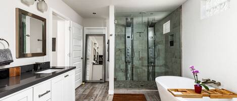 Combined shower/bathtub, hair dryer, towels, soap
