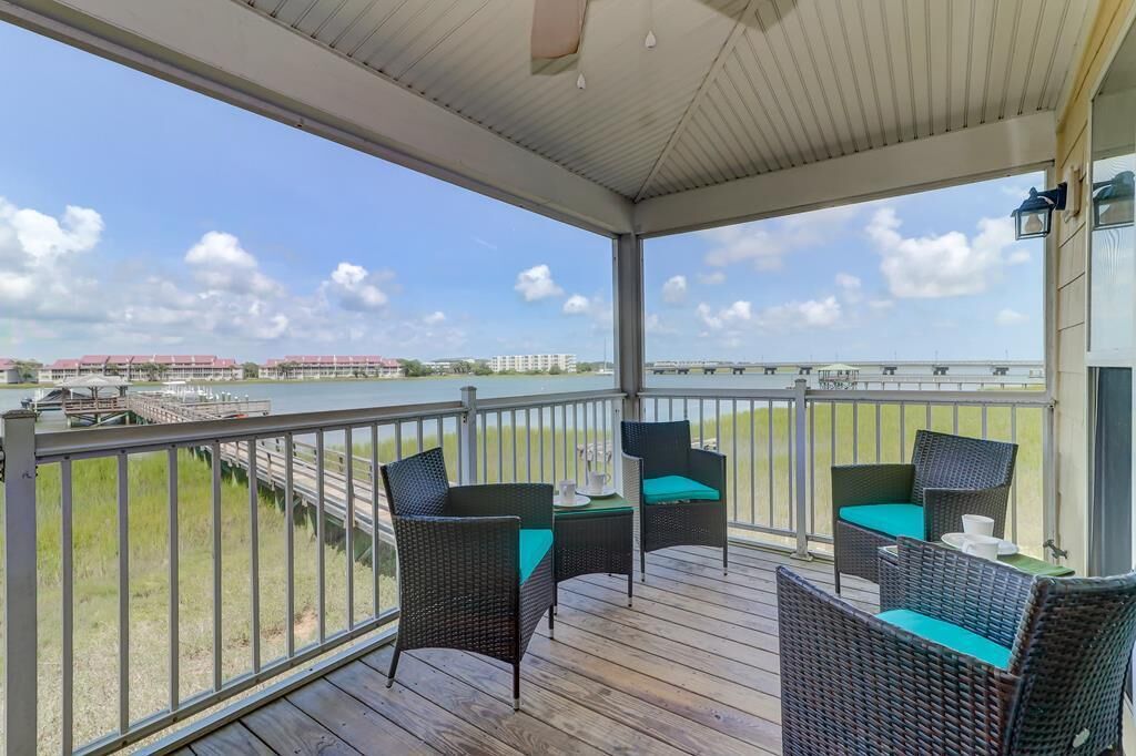 Premier Riverfront Town Home! Screened porch, Community Pool Access, & Fishing Dock!
