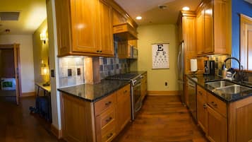 Coffee/tea maker, paper towels, dining tables