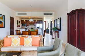Superior Condo, 2 Bedrooms, 2 Bathrooms, Ocean View | Living room | TV, DVD player - Golden Bear Getaway (Punta Cana)