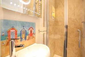 Shower, free toiletries, hair dryer, towels