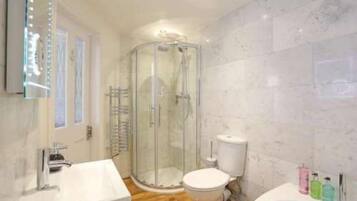 Shower, free toiletries, hair dryer, towels
