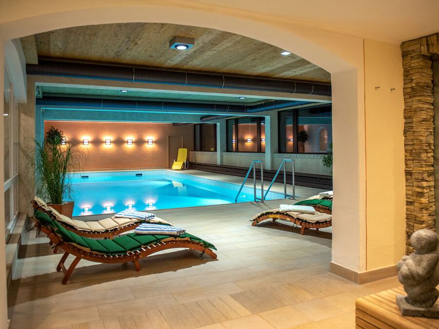 Indoor pool, open 8:00 AM to 8:30 PM, pool umbrellas, sun loungers
