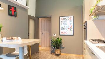 Apartment, 1 Bedroom | Private kitchen | Fridge, microwave, stovetop, coffee/tea maker