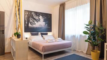 Apartment, 1 Schlafzimmer | Schreibtisch, Bügeleisen/Bügelbrett, kostenloses WLAN, Bettwäsche