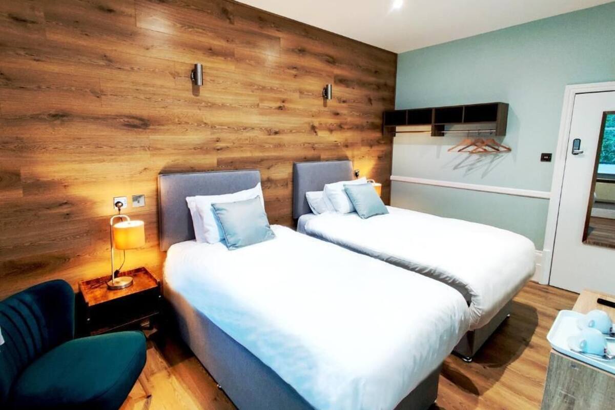 Twin Room | Iron/ironing board (on request), WiFi (free)